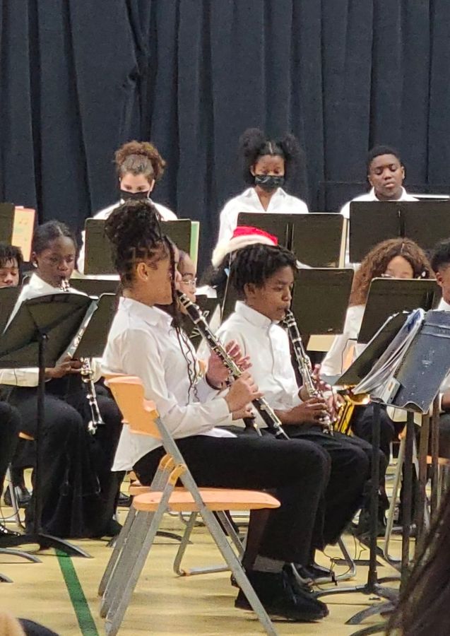 Playing clarinet in a school band concert