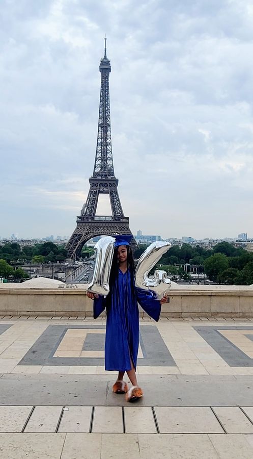 Graduation celebration in Paris in front of the Eiffel Tower